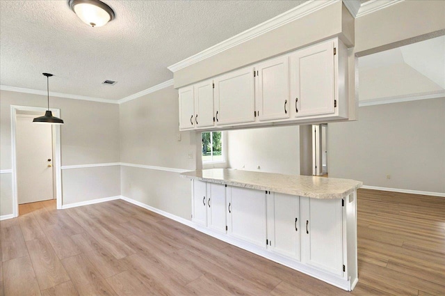 1538 Mclawrence Way, Tallahassee, FL 32317 - unfurnished room with light wood finished floors, a textured ceiling, baseboards, and ornamental molding