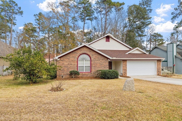 view of front of home with a garage and a front yard