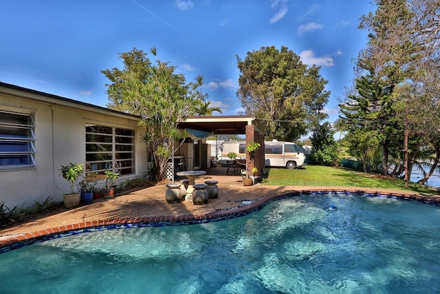 view of pool with a patio area