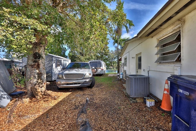 view of side of home with cooling unit