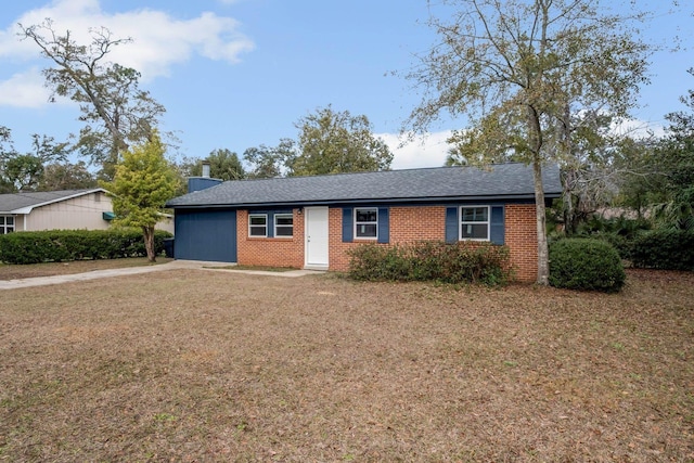 ranch-style house with a front yard