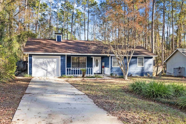 ranch-style home featuring a porch and a garage