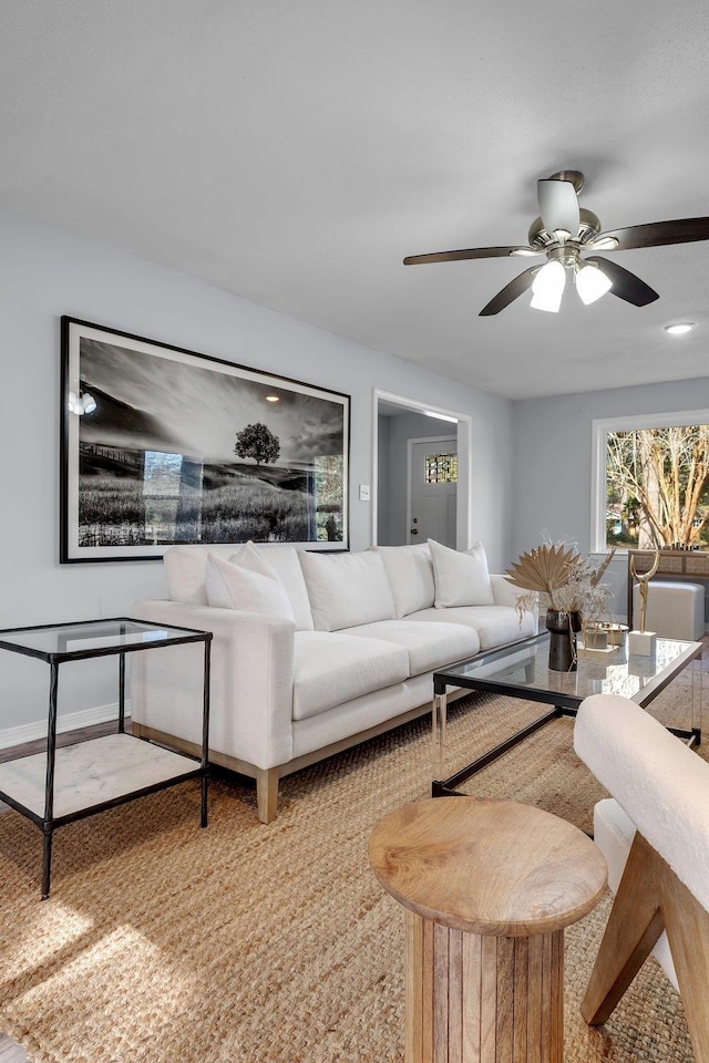 living room with ceiling fan