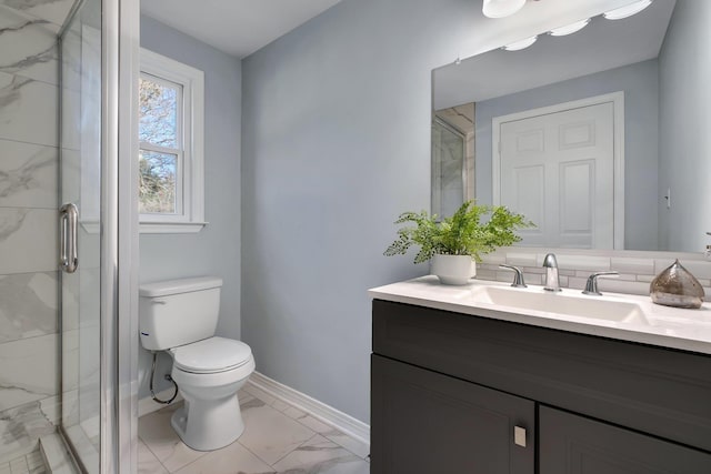 bathroom with vanity, toilet, and walk in shower