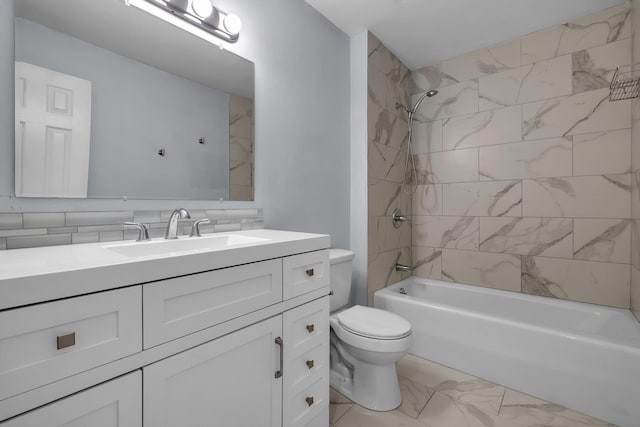 full bathroom featuring tiled shower / bath combo, vanity, and toilet