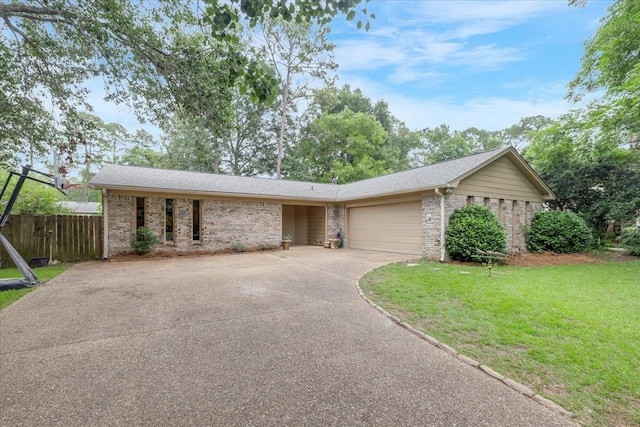 3256 N Shannon Lakes Dr, Tallahassee, FL 32309 - view of front of property featuring brick siding, driveway, and a garage