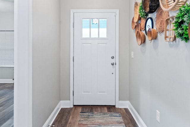 10732 Sycamore Ridge Ln, Tallahassee, FL 32305 - doorway to outside with dark wood-style flooring and baseboards