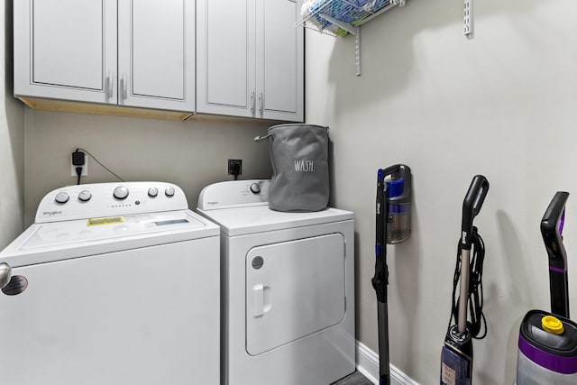 10732 Sycamore Ridge Ln, Tallahassee, FL 32305 - laundry area with washer and clothes dryer and cabinet space