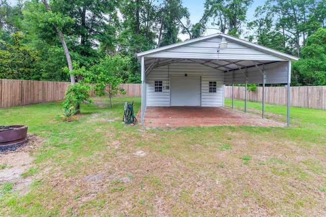 10732 Sycamore Ridge Ln, Tallahassee, FL 32305 - rear view of property featuring a detached garage