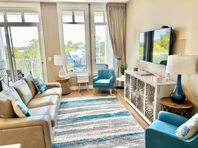 9100 Baytowne Wharf Boulevard 470/472, Walton Beaches, FL 32550 - sitting room featuring wood finished floors, plenty of natural light, and baseboards