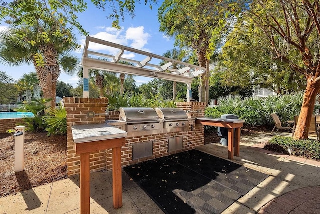 9100 Baytowne Wharf Boulevard 470/472, Walton Beaches, FL 32550 - view of patio featuring a pergola
