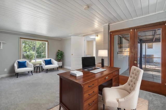 office space with baseboards, french doors, wood ceiling, and light colored carpet