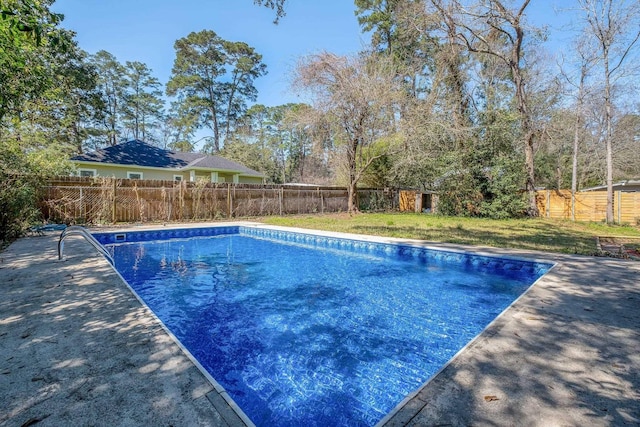 view of pool featuring a fenced backyard, a fenced in pool, and a yard