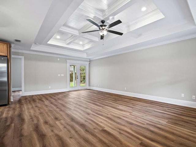 unfurnished living room featuring ceiling fan, dark wood-type flooring, crown molding, and coffered ceiling