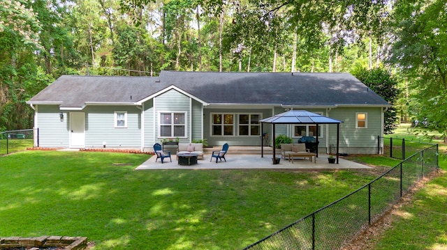 4557 Running Meadows Ln, Tallahassee, FL 32303 - back of house featuring an outdoor hangout area, a gazebo, a patio area, a fenced backyard, and view of wooded area