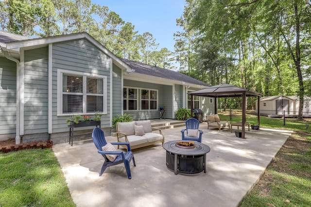 4557 Running Meadows Ln, Tallahassee, FL 32303 - view of patio / terrace with a gazebo and an outdoor living space with a fire pit