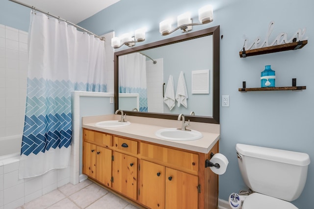 4557 Running Meadows Ln, Tallahassee, FL 32303 - bathroom with double vanity, tiled shower / bath, and tile patterned flooring