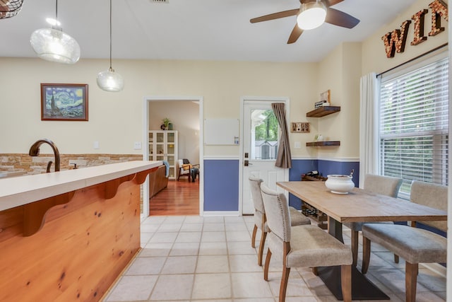 4557 Running Meadows Ln, Tallahassee, FL 32303 - dining area with ceiling fan and light tile patterned flooring