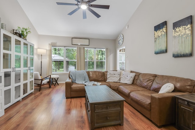 4557 Running Meadows Ln, Tallahassee, FL 32303 - living area with high vaulted ceiling, ceiling fan, and wood finished floors