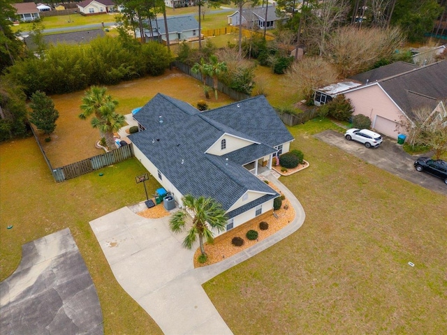 birds eye view of property with a residential view