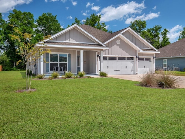 view of front of property featuring a garage, covered porch, and a front yard