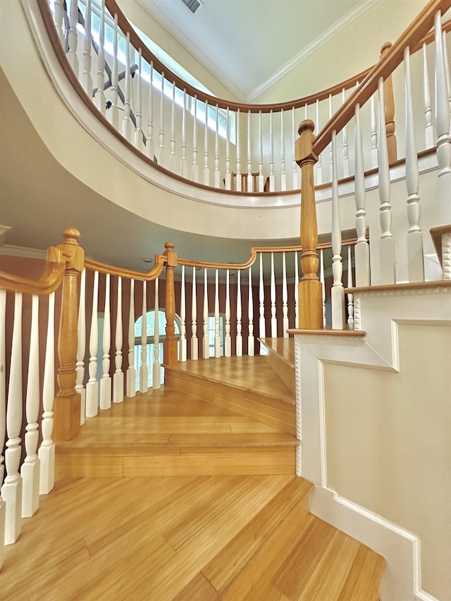 10 Yvonne Ct, Havana, FL 32333 - stairs with vaulted ceiling, crown molding, and wood finished floors