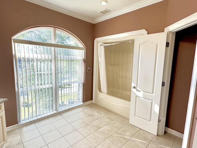 10 Yvonne Ct, Havana, FL 32333 - bathroom featuring tile patterned flooring, ornamental molding, and shower / bathtub combination with curtain