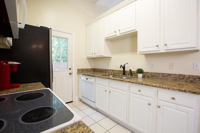 kitchen with dishwasher, light tile patterned floors, white cabinetry, and sink