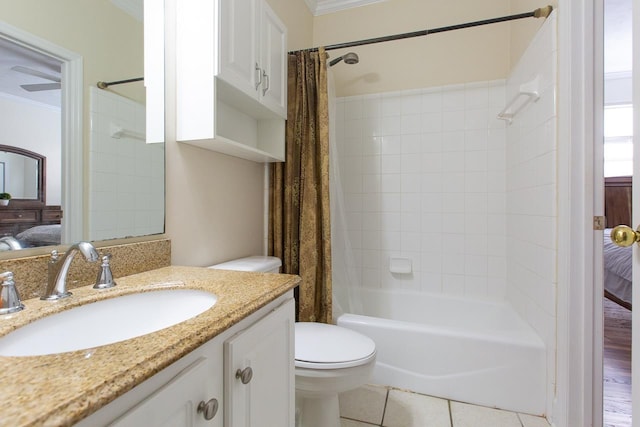 full bathroom featuring tile patterned flooring, vanity, toilet, and shower / bathtub combination with curtain