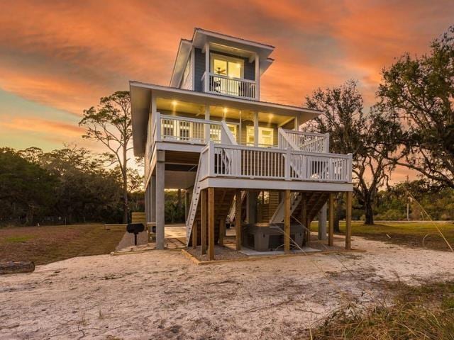 exterior space featuring stairs and a deck