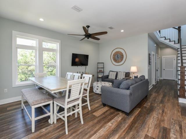 living area with stairway, dark wood finished floors, visible vents, and recessed lighting