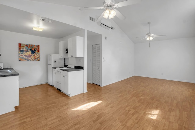 kitchen with lofted ceiling, white cabinetry, light wood-type flooring, ceiling fan, and white appliances