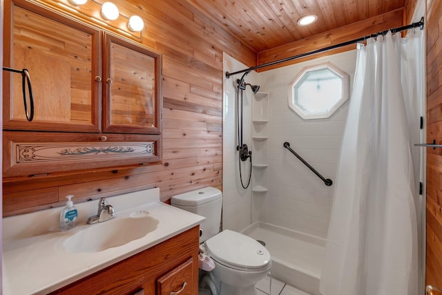 bathroom with vanity, wooden walls, toilet, and walk in shower