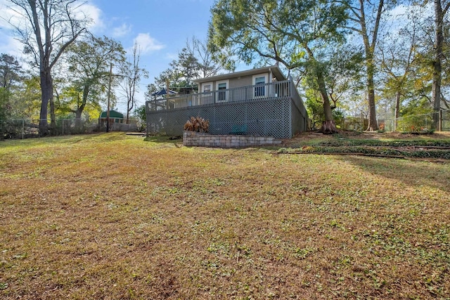 view of yard with a wooden deck