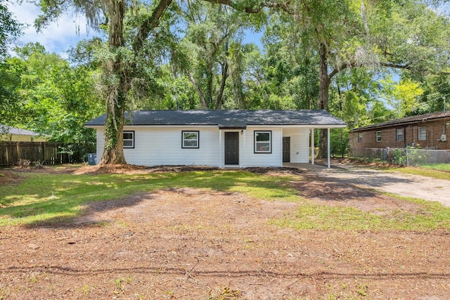 3204 N Ridge Rd, Tallahassee, FL 32305 - ranch-style house featuring driveway and a carport