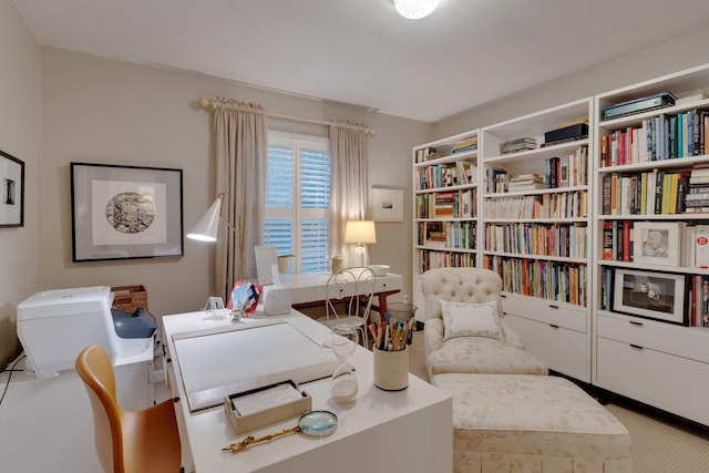 sitting room with carpet flooring