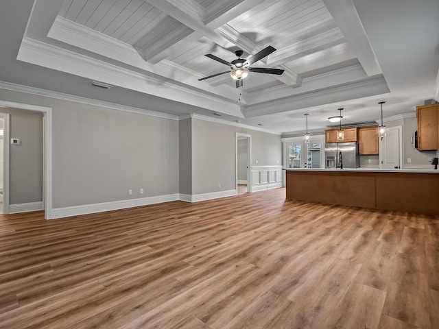 unfurnished living room featuring ceiling fan, beamed ceiling, crown molding, coffered ceiling, and light wood-type flooring