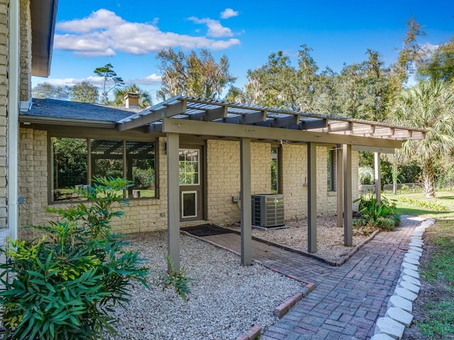 exterior space featuring central AC unit