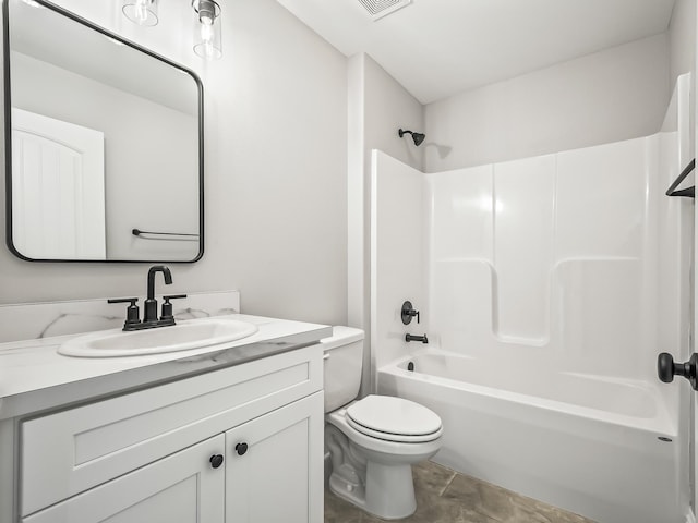 full bathroom featuring vanity, toilet, and washtub / shower combination