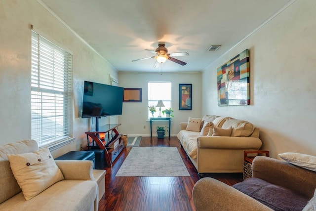 living room featuring ornamental molding, ceiling fan, and dark hardwood / wood-style floors