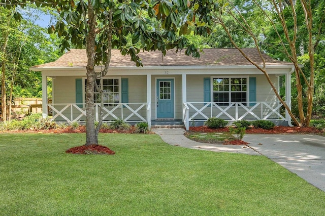 32 Pirates Cove Ln, Saint Marks, FL 32355 - view of front of house featuring a porch and roof with shingles