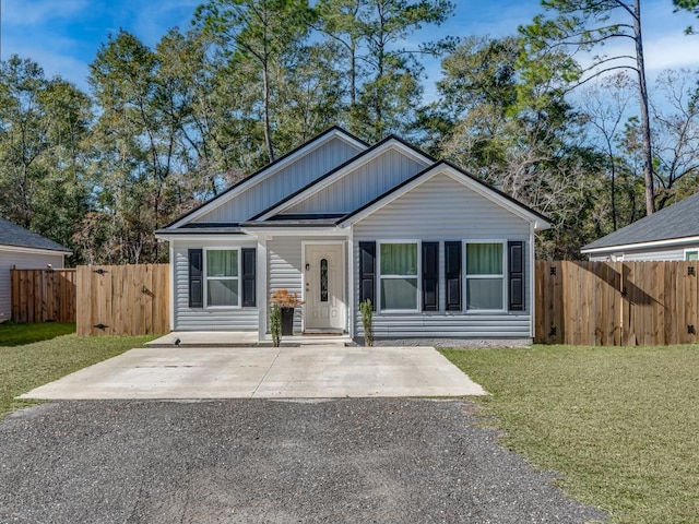 view of front of home with a front yard