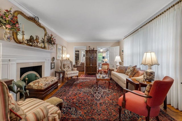 1540 Isabel Ct, Tallahassee, FL 32303 - living area with wood finished floors, a fireplace, and ornamental molding
