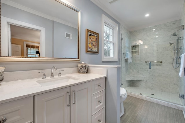1540 Isabel Ct, Tallahassee, FL 32303 - bathroom featuring vanity, a marble finish shower, and ornamental molding