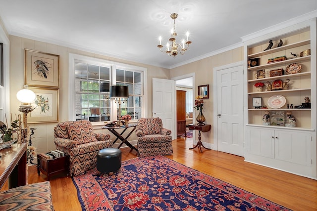 1540 Isabel Ct, Tallahassee, FL 32303 - living area with wood finished floors, a chandelier, and ornamental molding