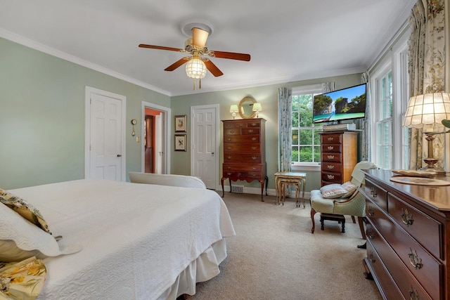 1540 Isabel Ct, Tallahassee, FL 32303 - bedroom featuring ornamental molding, light carpet, and a ceiling fan