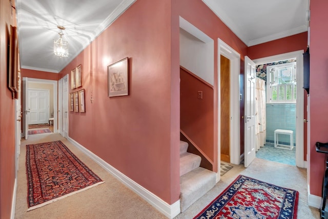 1540 Isabel Ct, Tallahassee, FL 32303 - hall featuring ornamental molding, light carpet, stairway, and a chandelier