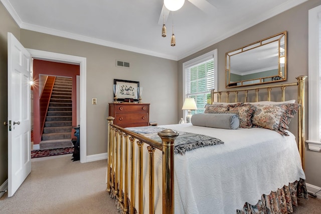 1540 Isabel Ct, Tallahassee, FL 32303 - carpeted bedroom with ornamental molding and ceiling fan