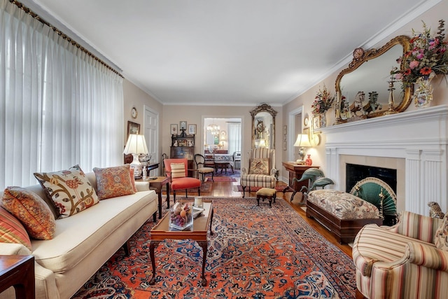 1540 Isabel Ct, Tallahassee, FL 32303 - living area with wood finished floors, ornamental molding, and a fireplace