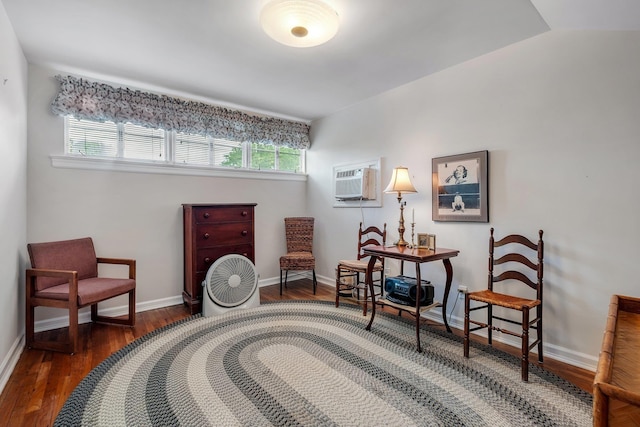 1540 Isabel Ct, Tallahassee, FL 32303 - living area with plenty of natural light, wood finished floors, and a wall mounted AC